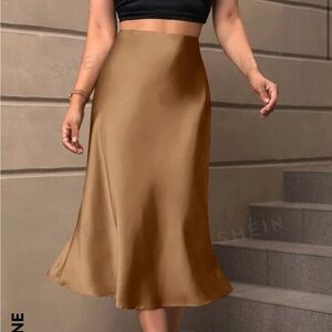 Satin skirts in pink, beige, cream, blue